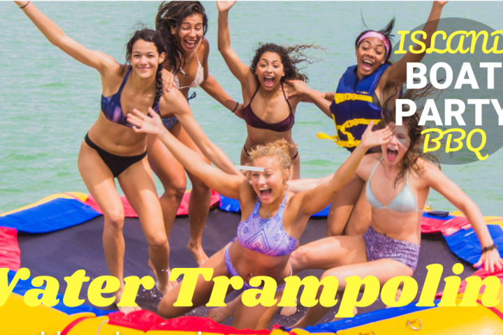 a group of people sitting at a beach