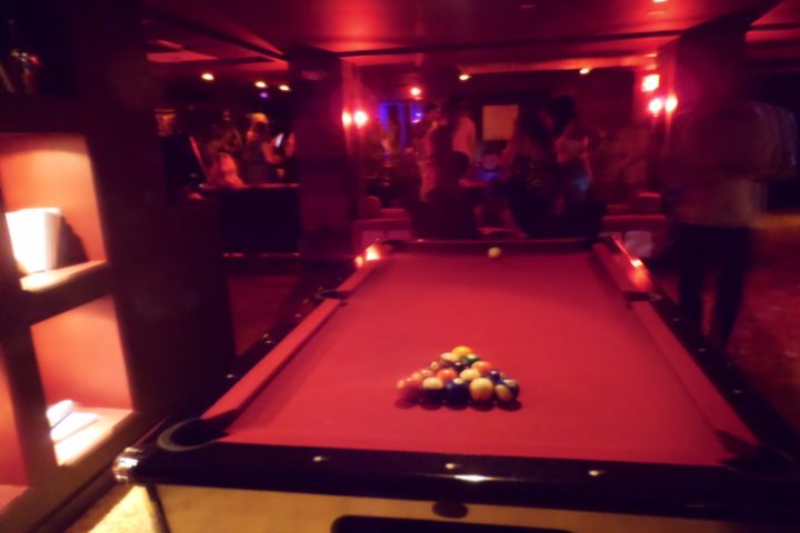 a table with a ball in a room